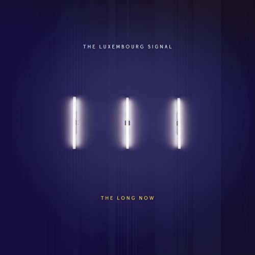 Album cover for “The Long Now” by The Luxembourg Signal, featuring three lights.
