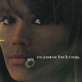 Close-up of Françoise Hardy with a flower near her mouth on album cover.