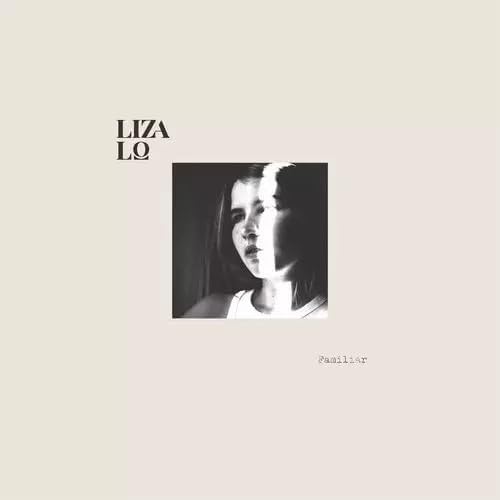 Black and white portrait of Liza Lo on a pale background.