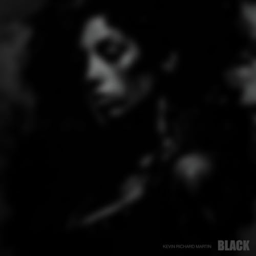 Blurred black and white portrait with “BLACK” text at the bottom.