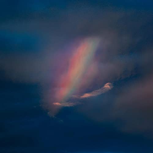 Dark blue and pink cloudscape, abstract and atmospheric.
