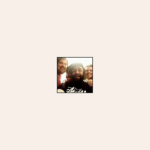CD cover featuring four casually dressed men with beards.