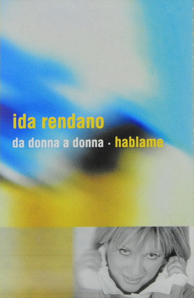 Vinyl record cover with yellow and blue abstract design, portrait below.