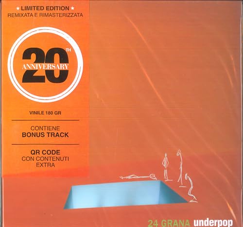Orange vinyl record cover with a circular “20” logo and cut-out design.