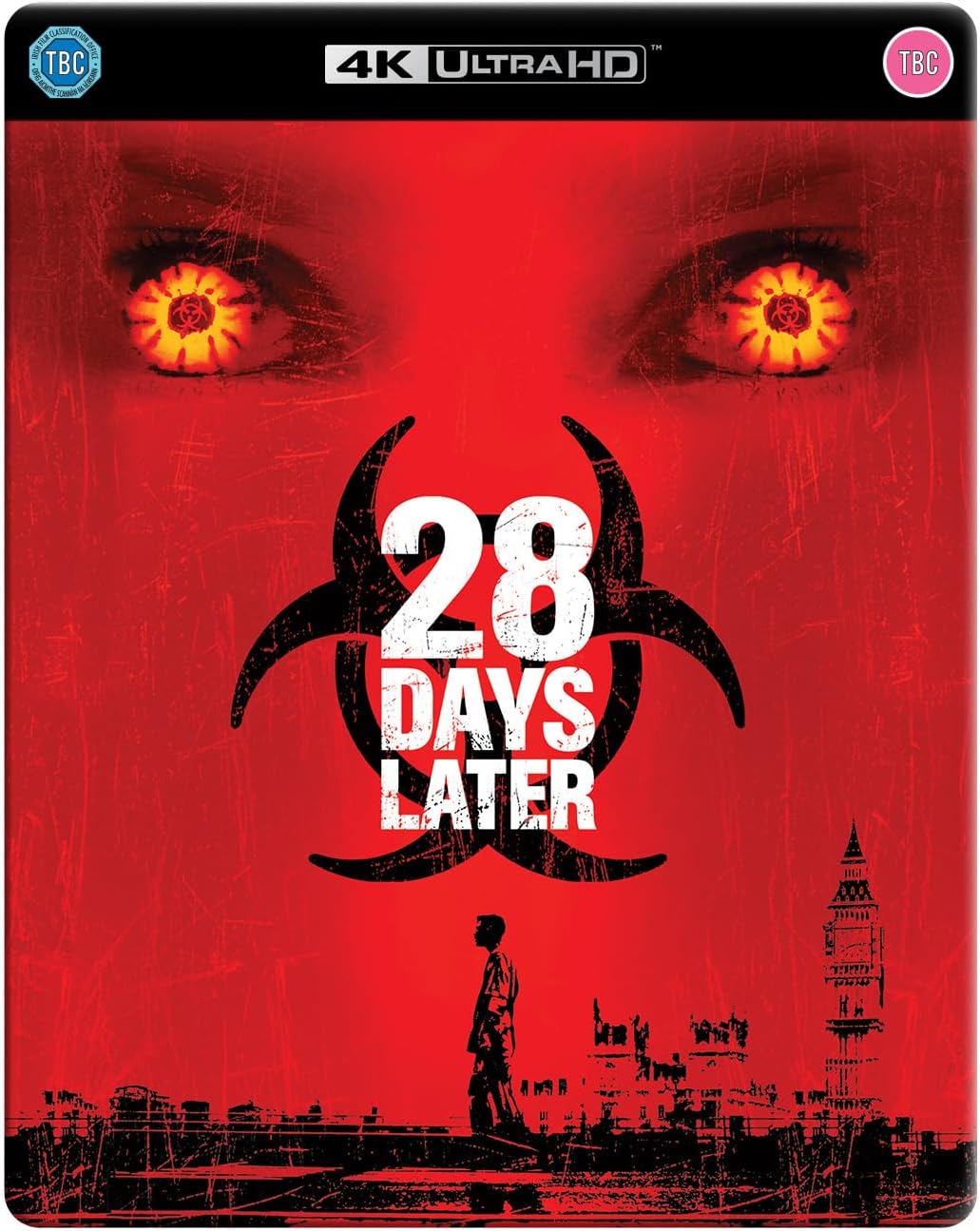 Red steelbook cover for "28 Days Later" with intense, glowing eyes.
