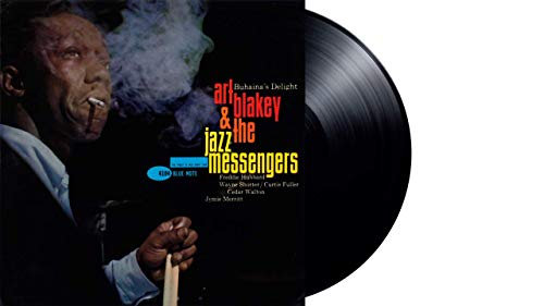 Art Blakey album cover with a vinyl record beside it.