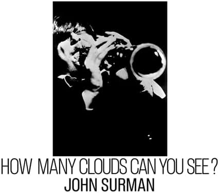 Black and white album cover featuring a person blowing bubbles.