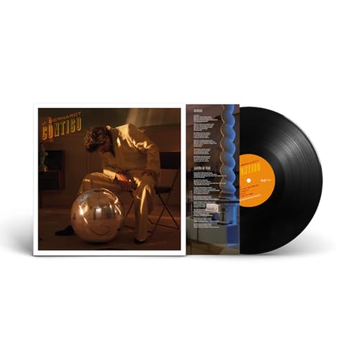 “Contigo” vinyl record by J. Bernardt, featuring a seated figure on the cover.
