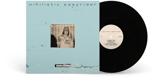 Vinyl record with light blue cover featuring a black and white photograph.