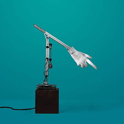 Mechanical arm with a white glove pointing on teal background.