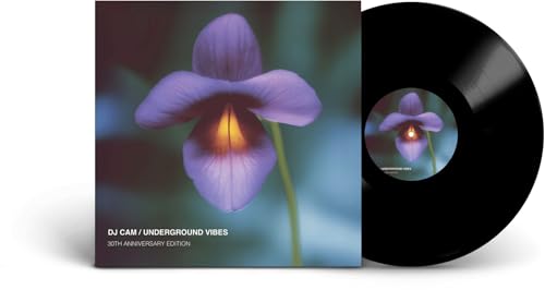 Vinyl record with cover art featuring a close-up of a purple flower.