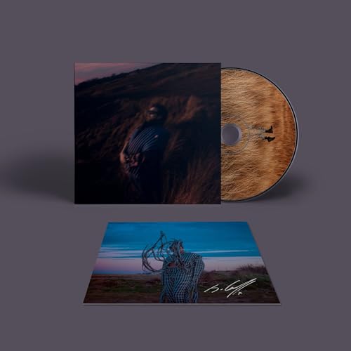 CD and card with a man pictured against a landscape, signed.