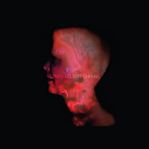 CD cover: red, distorted profile of a person against black.