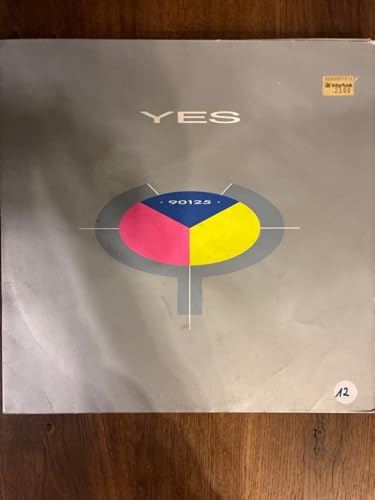Yes 90125 vinyl record cover with a circular pink, yellow, and blue design.
