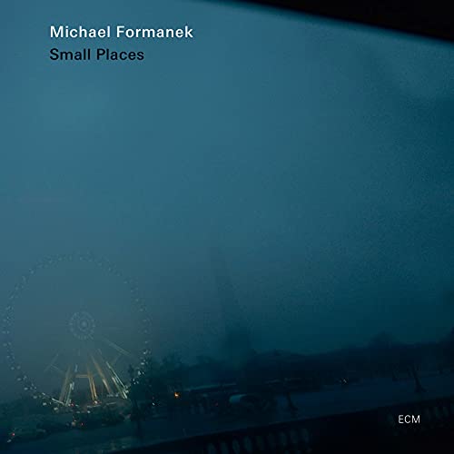 CD cover for Michael Formanek’s “Small Places” with a blurred Ferris wheel.