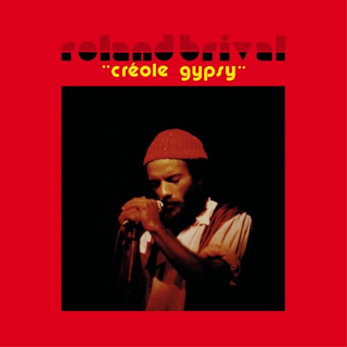 Red album cover featuring a portrait of a man with a microphone.