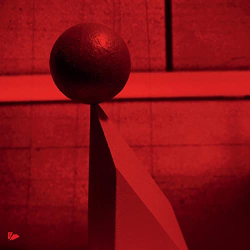 Red vinyl record cover with a spherical object and angled stripe.