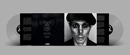 Black and white vinyl record with a portrait of a veiled person.
