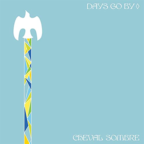 CD cover: blue background with white bird and colorful geometric design.