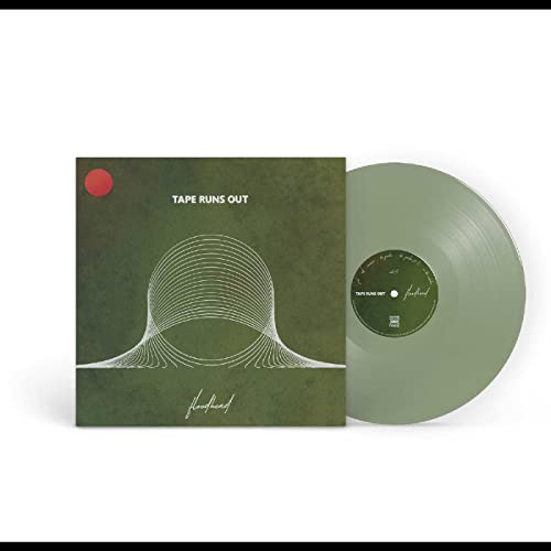 Green vinyl record and cover with abstract line art and red dot.