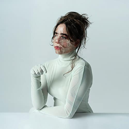 Woman with taped face and white turtleneck, CD cover art.