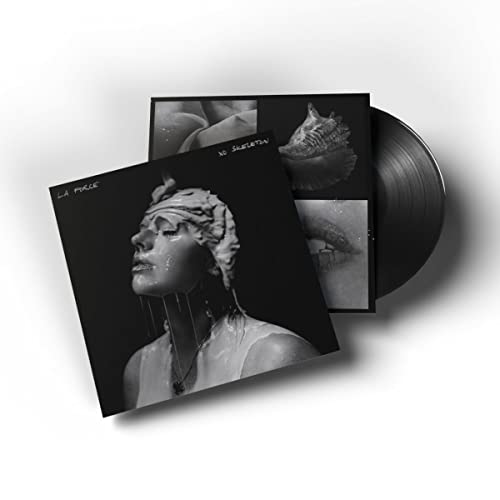 Vinyl record and album cover featuring a portrait of a person with a shell.