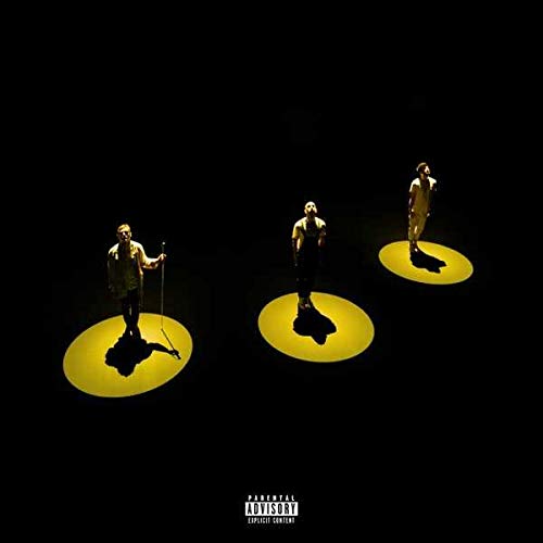 Three figures stand spotlighted on dark background, album cover for X Ambassadors’ ORION.