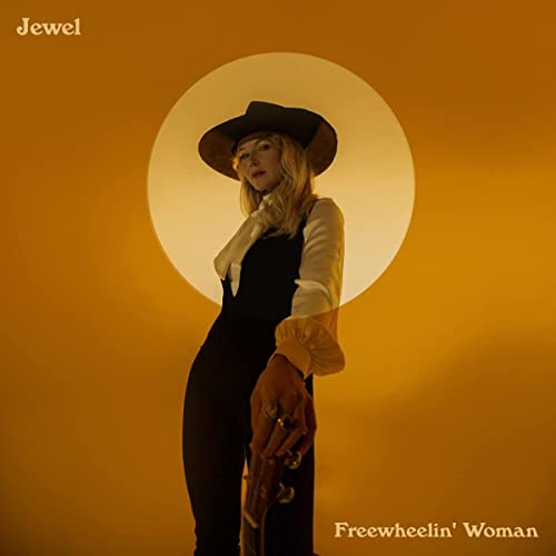Jewel album cover: woman in hat with guitar, warm orange background.
