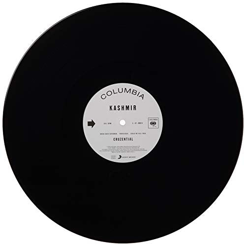 Black vinyl record with white label displaying “Kashmir” and tracklist details.