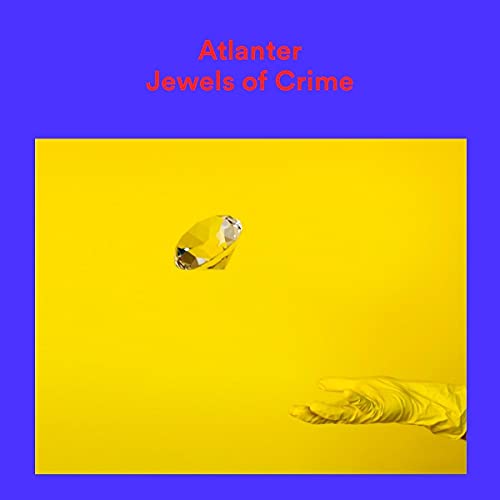 Album cover: yellow background, diamond, and a reaching hand.