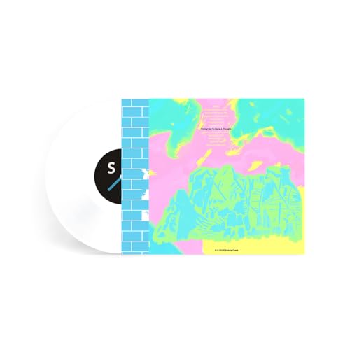 White vinyl record with colorful, abstract album art featuring brick wall detail.