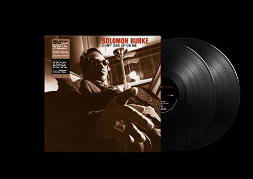 Solomon Burke album cover with two black vinyl records on a black background.