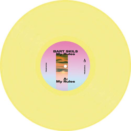 Bright yellow vinyl record with a central label featuring a sunset graphic and text.