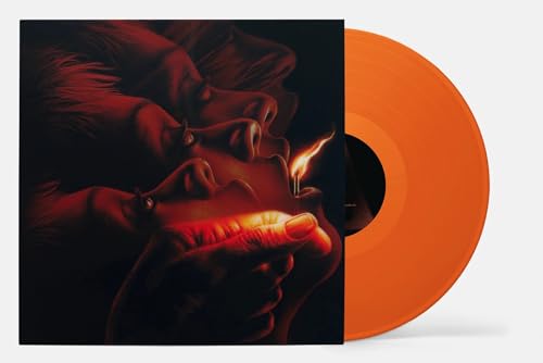 “Talk to Me” soundtrack vinyl record with orange disc and cover art.