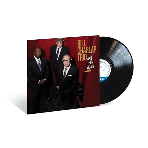 Vinyl record and album cover featuring three men in suits.