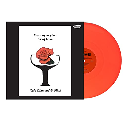 Vinyl record with orange disc and cover featuring a rose in a glass.