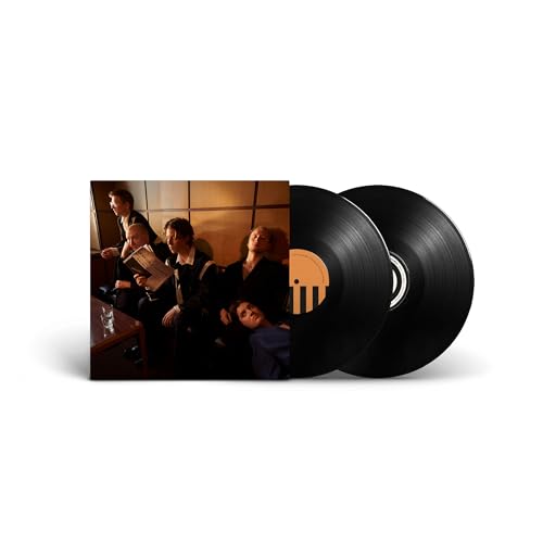 Vinyl record with cover art depicting a group of people indoors.