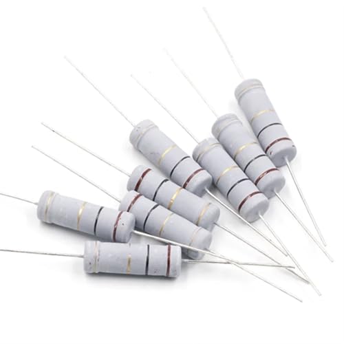 Resistors with silver and red bands scattered on a white surface.