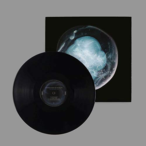 Black vinyl record with album cover showing swirling blue and white art.