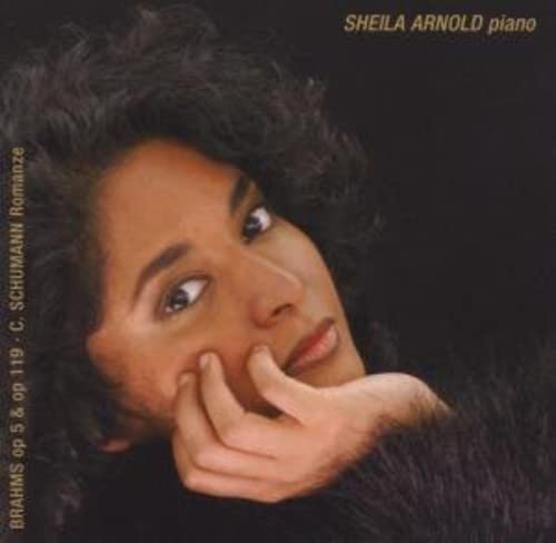 CD cover featuring portrait of pianist Sheila Arnold, dark background.