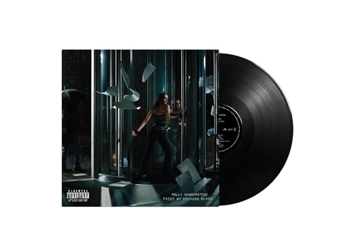 Holly Humberstone vinyl record cover with artist in a dark room.