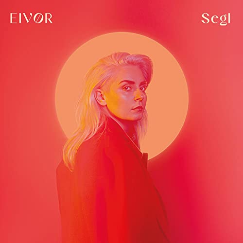 Eivør album cover: woman’s portrait against a red and orange background.