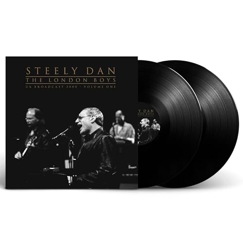Steely Dan vinyl record and album cover featuring band members performing.