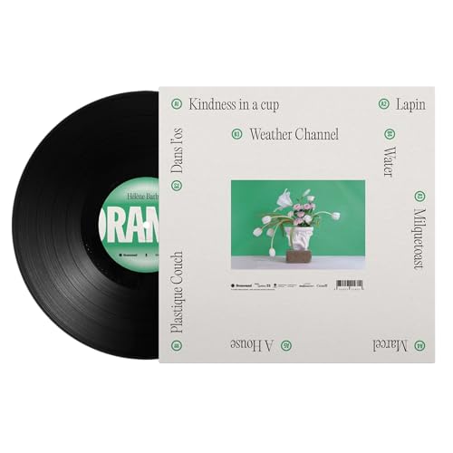 Vinyl record with a white album cover featuring flowers in a vase.