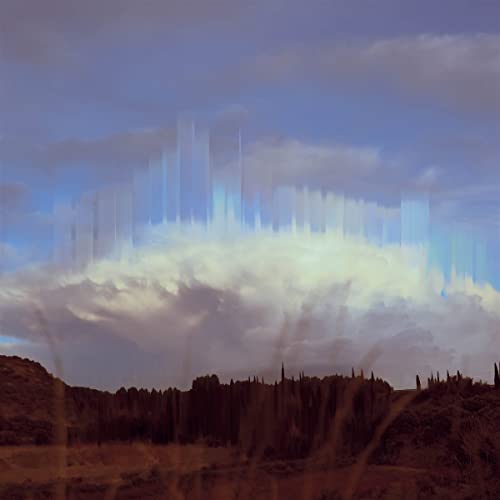 Abstract album cover with blurred blue and white sky over dark hills.