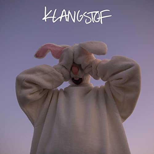 PersonC.D. cover featuring a personS person in a white bunny costume covering their eyes.