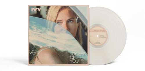 Ivy’s “Traces Of You” vinyl record with a woman’s portrait on the cover.