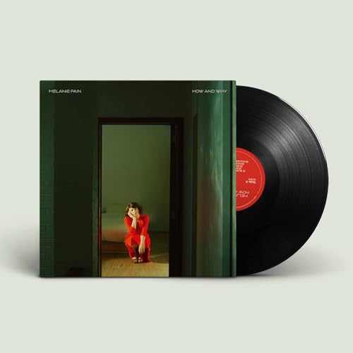 Vinyl record and album cover featuring a woman in a doorway.