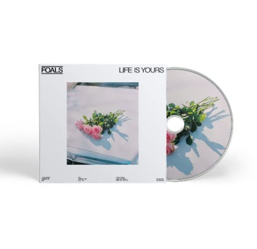 Foals “Life Is Yours” CD case with flowers on a car hood.