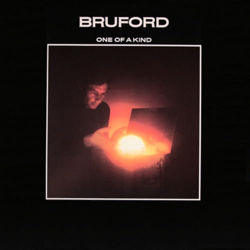 Bruford “One Of A Kind” vinyl album cover with a man and light.